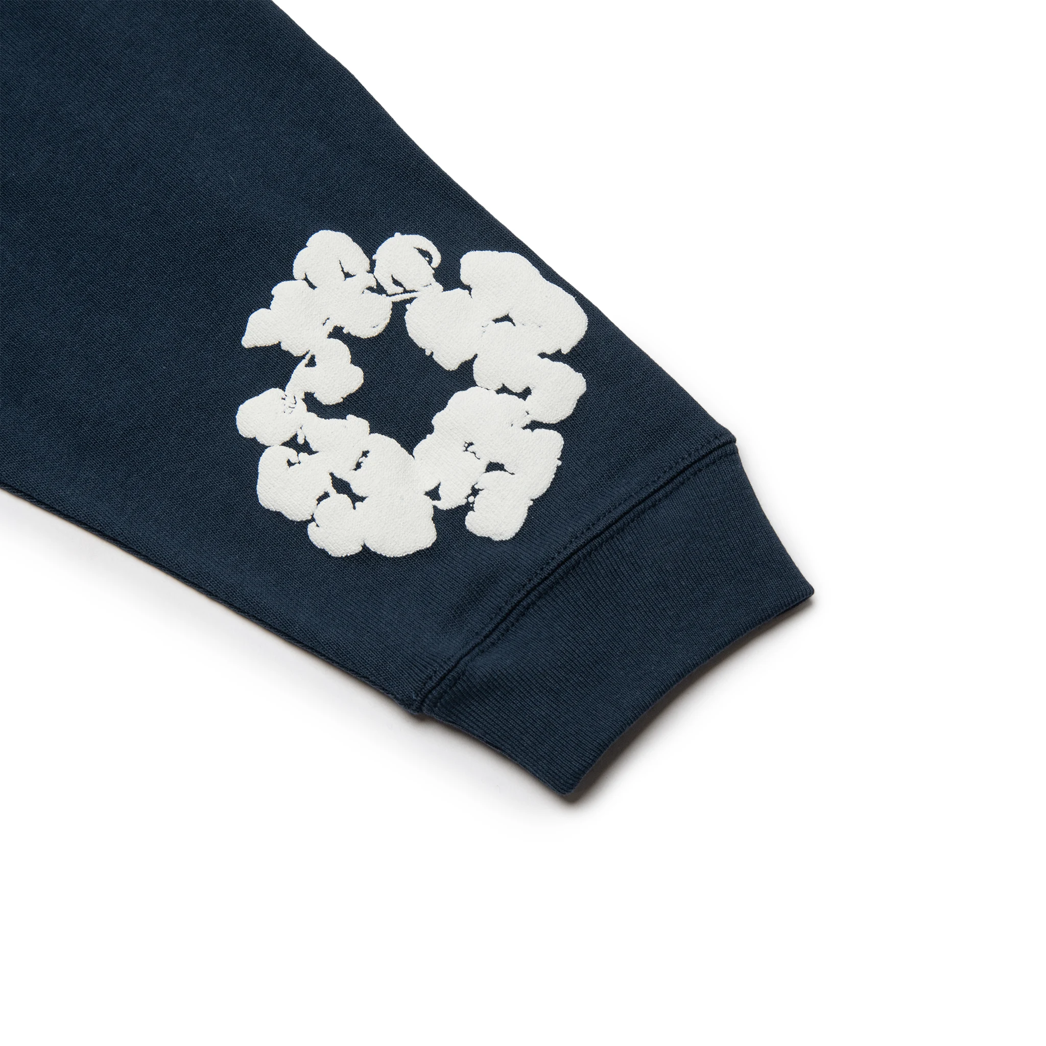 Sleeve view of Denim Tears The Cotton Wreath Long-Sleeve Navy T Shirt